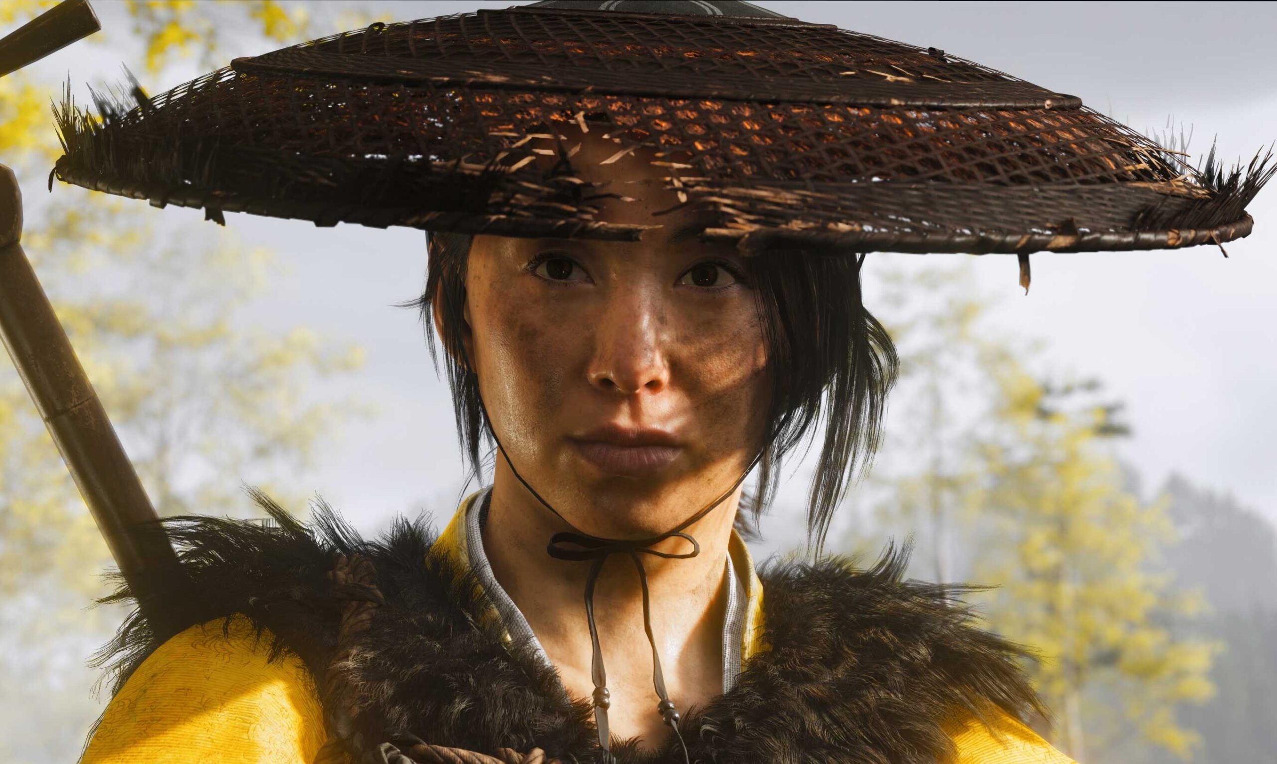 Escena de exploración de mundo abierto, mostrando un paisaje nevado en Ghost of Yōtei.